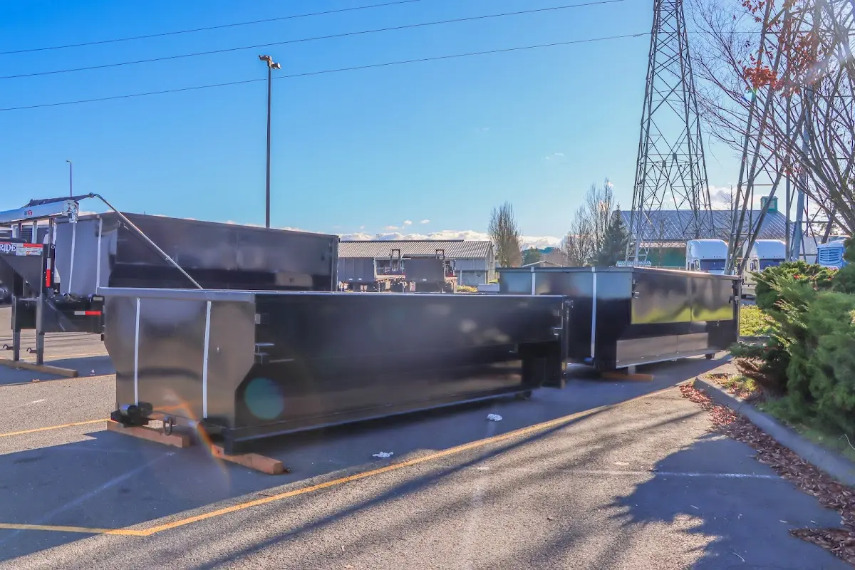 Roll-off dumpster ready for waste disposal at job site for 4 Yard Dumpster Rental in Kirtland